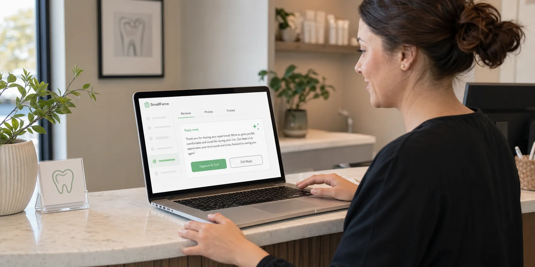 Small business front desk manager reviewing an AI-drafted review reply